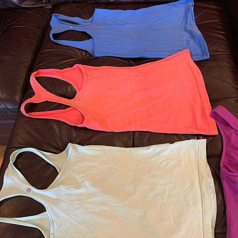 Four Lululemon Tanks all size 4